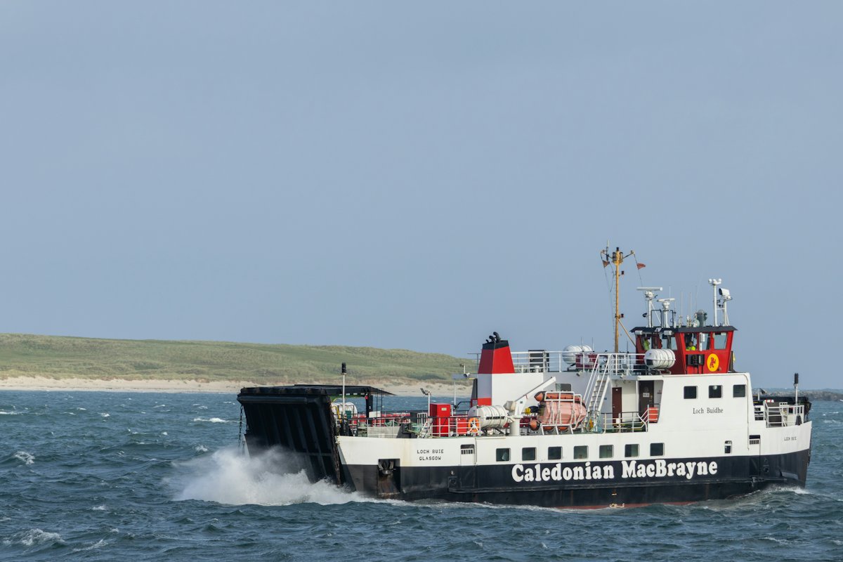 A Caledonian MacBrayne car ferry crossing open water near Fionnphort